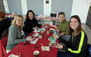 Group of four women at a table at USO soap event