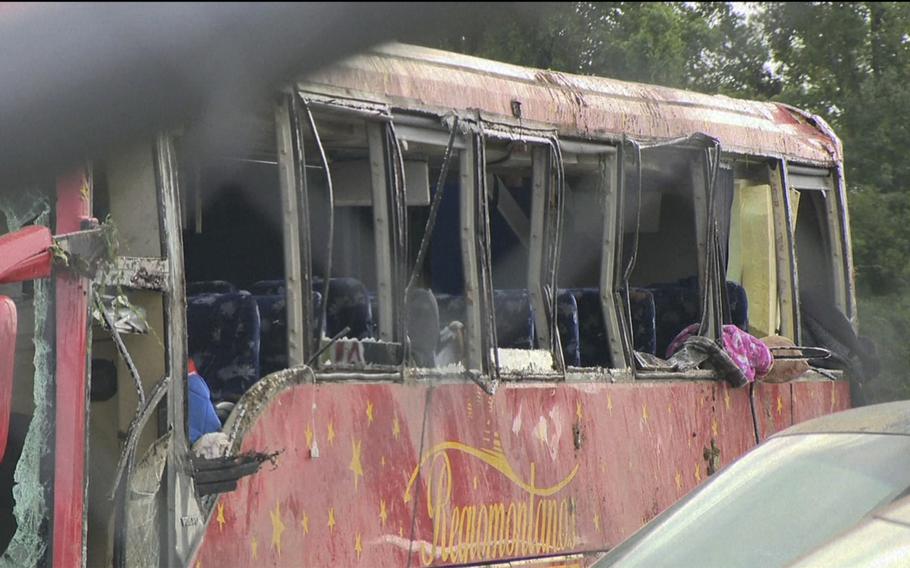 A damaged bus is shown after several people were killed and dozens injured after the commercial bus overturned on Interstate 20 early Saturday, Aug. 31 2024 in Warren County, Miss., according to the Mississippi Highway Patrol.