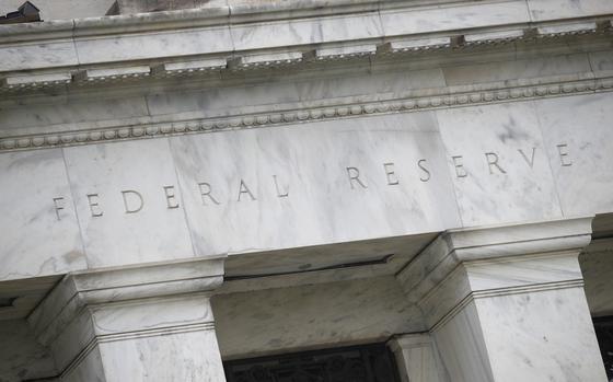 FILE - The Federal Reserve building in seen in Washington, May 22, 2020. (AP Photo/Patrick Semansky, File)