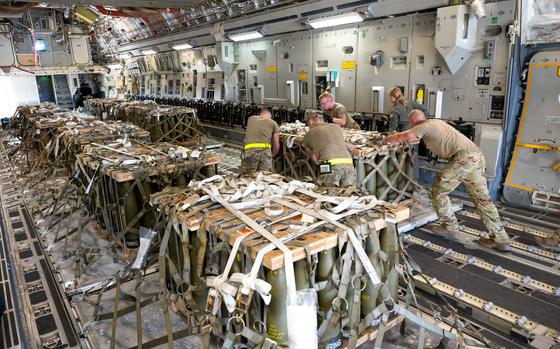 Team Dover Airmen load pallets of ammunition onto a C-17 Globemaster III bound for Ukraine during a security assistance mission at Dover Air Force Base, Delaware, Aug. 9, 2022. The Department of Defense is providing Ukraine with critical capabilities to defend against Russian aggression under the Ukraine Security Assistance Initiative. Since 2014, the United States has committed more than $11.8 billion in security assistance to Ukraine. (This photo has been altered to protect operational security.) (U.S. Air Force photo by Airman 1st Class Cydney Lee)