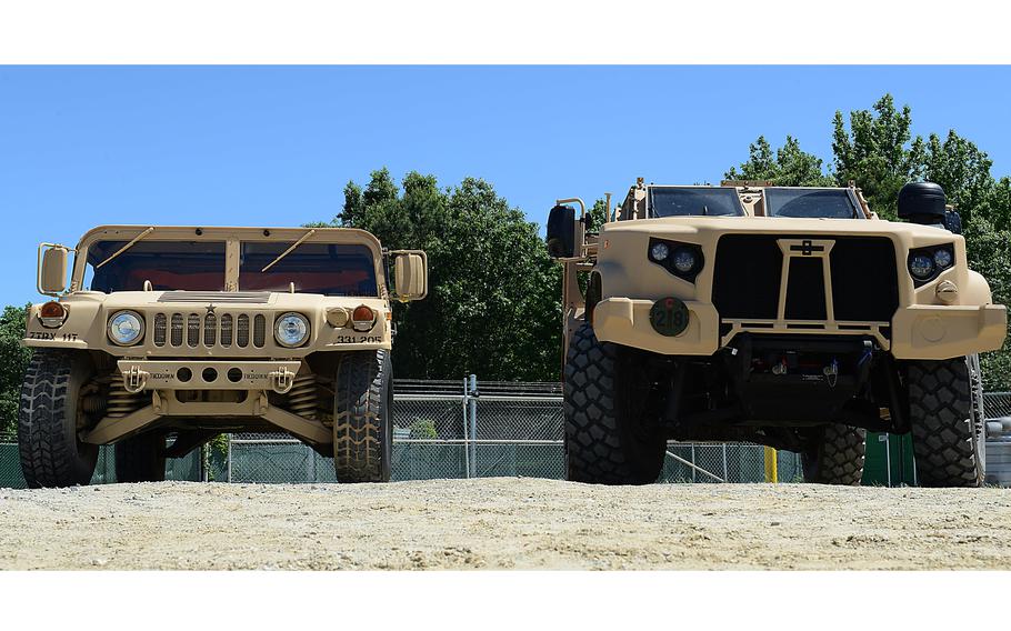 The fronts of a Humvee and a JLTV seen side by side.