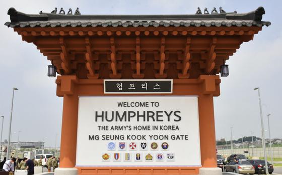 A sign shows the entrance to Camp Humphreys.