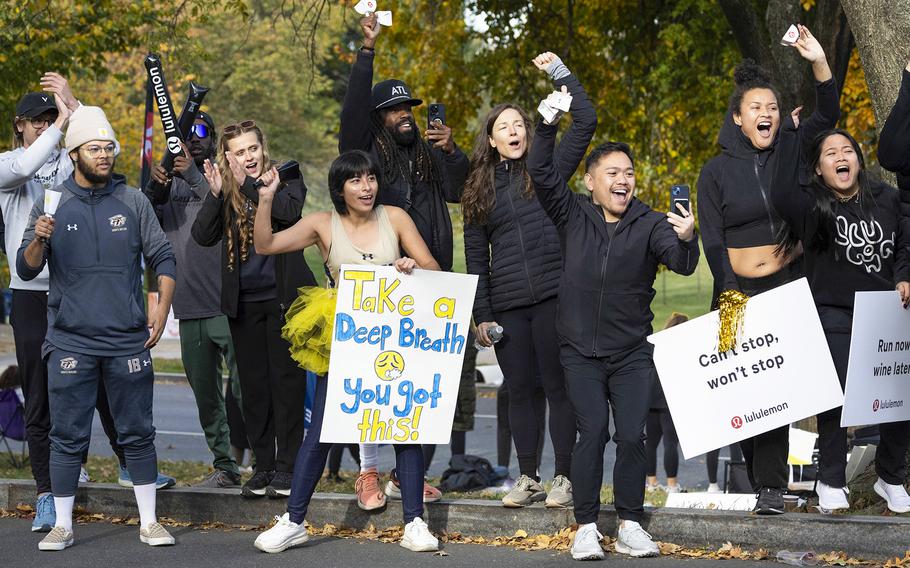 Fans show their support with signs