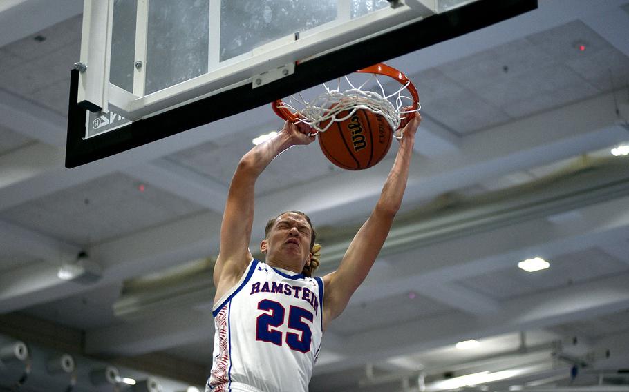 Kelan Vaughn dunks the ball.