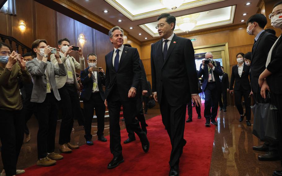 U.S. Secretary of State Antony Blinken, left, walks with China’s Foreign Minister Qin Gang ahead of a meeting at the Diaoyutai State Guesthouse in Beijing on June 18, 2023. 