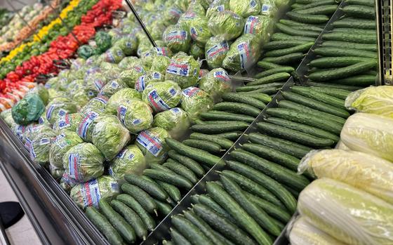 Lettuce, cucumbers and other fresh vegetables line the produce section at the commissary at Camp Humphreys.