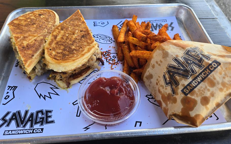 A sandwich, fries and dip on a tray at Savage Sandwich Co. in Tumon, Gwam.