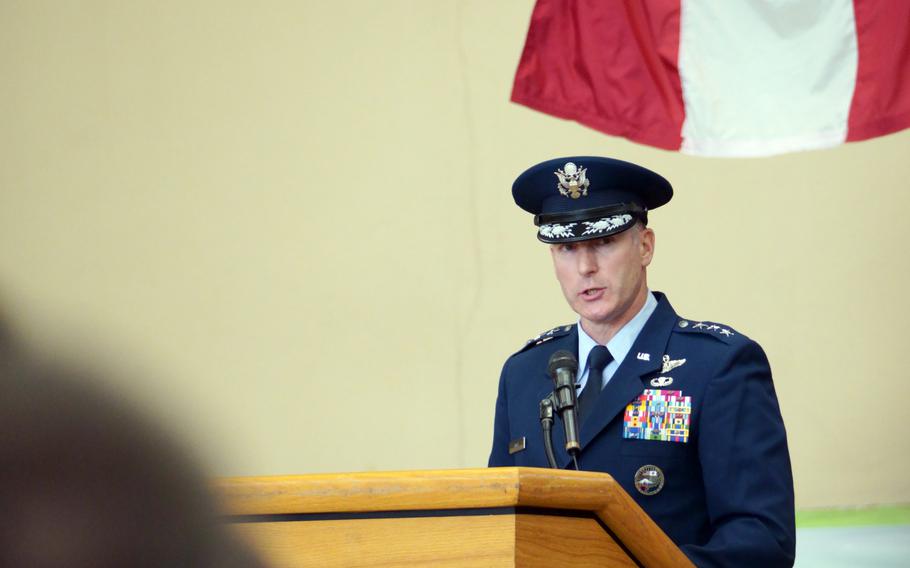 An Air Force general makes comments at a podium.