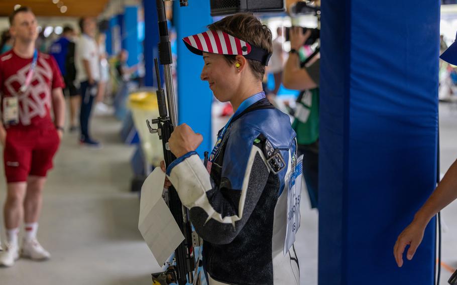 Army Sgt. Sagen Maddalena of the United States raises her fist in celebration during  the 50m rifle 3 positions women’s qualification round at the 2024 Summer Olympics, Thursday, Aug. 1, 2024, in Chateauroux, France. Maddalena scored 593 points out of a possible 600 and leads after qualifying.