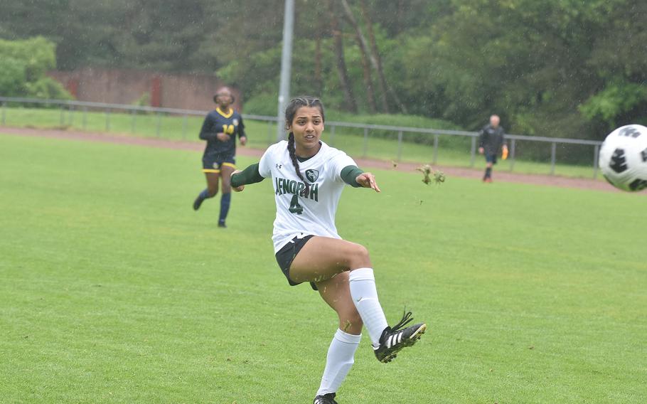 AFNORTH's Selah Skariah sends the ball - and a little turf - toward the goal Tuesday, May 21, 2024, in the Lions' 6-0 victory that clinched a spot in Thursday's championship game against Sigonella in the DODEA European Division III girls soccer championships at Landstuhl, Germany.