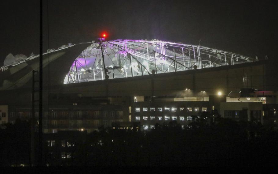 The roof of Tropicana Field in St. Petersburg appears badly damaged.