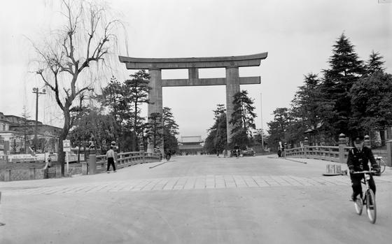 Kyoto, Japan, March 1955: The Otorii - the gateway to the Heian Jingu Shrine - in Kyoto, Japan as it was in March 1955. The torii (gateway to a sacred ground) is on of the largest in Japan, standing 24.4 meters (78 feet) tall and leads to the Oten-mon Gate - the front gate of the Heian Jingu Shrine.

For years Stars and Stripes pre-1964 negatives were thought to have been lost - that is until several months ago when a small batch of them was found. This 1955 image taken by Stars and Stripes photographer Neil E. Callahan is one of seven we found, all taken in and around Kyoto in late February or early March 1955. They are the oldest negatives we found to date in our Pacific Stars and Stripes archives. 

See all 7 images - and read the article accompanying the two which were published in the paper in March 1955 - here. 

META DATA: Japan; sightseeing; tourism; city; culture; Japanese culture; architecture; sacred sites; temple;