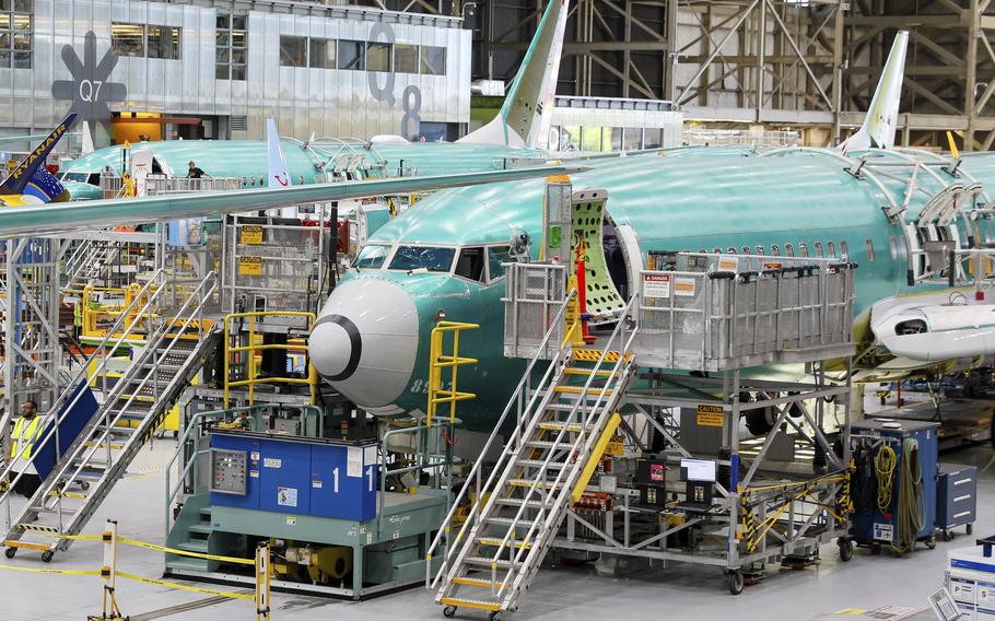 Boeing 737 MAX airplanes are shown on the assembly line