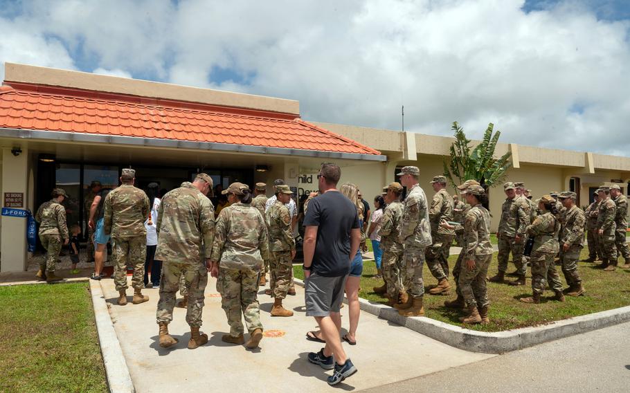 Airmen and their families attend a ribbon-cutting ceremony for the renewed Child Development Center at Andersen Air Force Base, Guam, May 10, 2024. 
