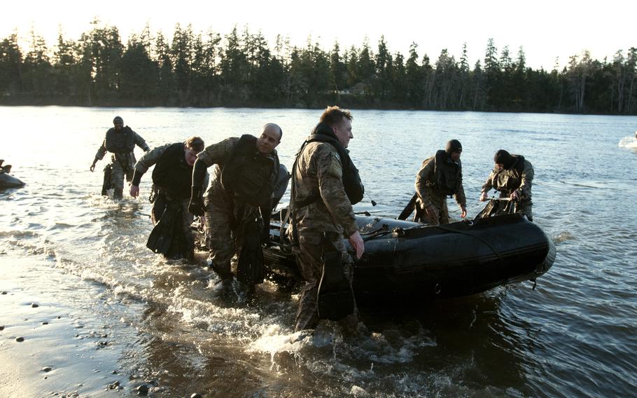 Soldiers return to shore after conducting water training on American Lake at Joint Base Lewis-McChord, Wash., in 2016.