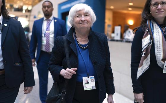 Secretary of the Treasury Janet Yellen, center, leaves the G20 meeting during the World Bank/IMF Annual Meetings in Washington, Thursday, Oct. 24, 2024. (AP Photo/Jose Luis Magana)