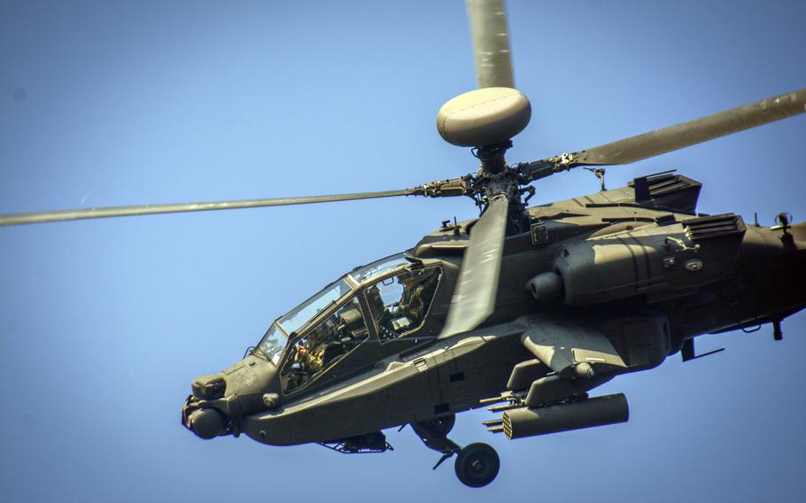 An AH-64E Apache helicopter flies over the Rodriguez Live Fire Complex in Pocheon, South Korea, Aug. 14, 2024. 