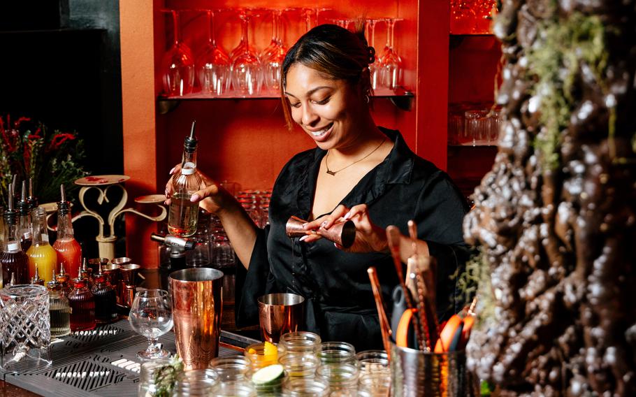The beverage director of Willow Bar, Lisa Posey, makes a “funky rum cocktail” called Stranded in Brazil under the bar’s fake willow tree. This inviting space reflects the untold, unrecognized contribution of the Black bartender in American culture.