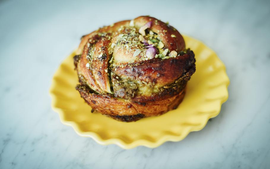 A babka with pistachios and rose petals.