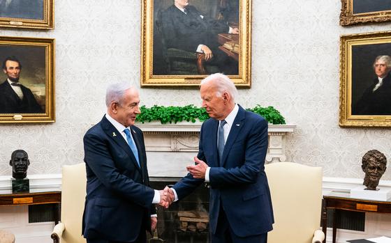 President Joe Biden shakes hands with Israeli Prime Minister Benjamin Netanyahu on July 25.