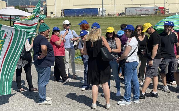 Italian employees from U.S. military bases in the country hold a demonstration as part of a two-day walk out near the south entrance to Aviano Air Base in June 2023. Another strike is looming on Nov. 4, 2024.