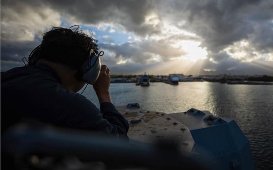 Quatermaster 3rd Class Woser Sakya stands watch on the bridge of the USS Fitzgerald on July 11 as the ship departs Joint Base Pearl Harbor-Hickam to participate in Rim of the Pacific exercises.