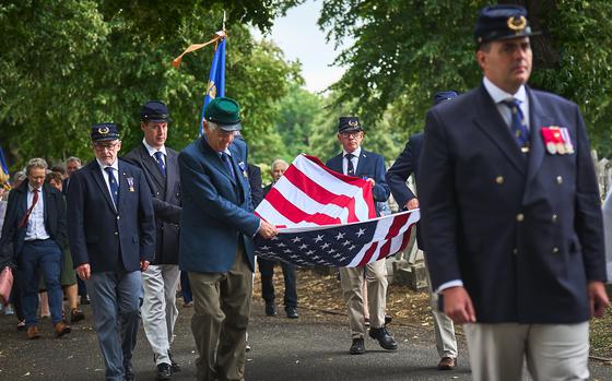 The Sons of Union Veterans of the Civil War walk to the gravesite of Civil War Union veteran Pvt. James Schobel White on Aug. 10, 2024, at the East London Cemetery Chapel in England. The Sons of Union Veterans of the Civil War hosts a memorial annually for fallen U.S. Civil War veterans in London. 