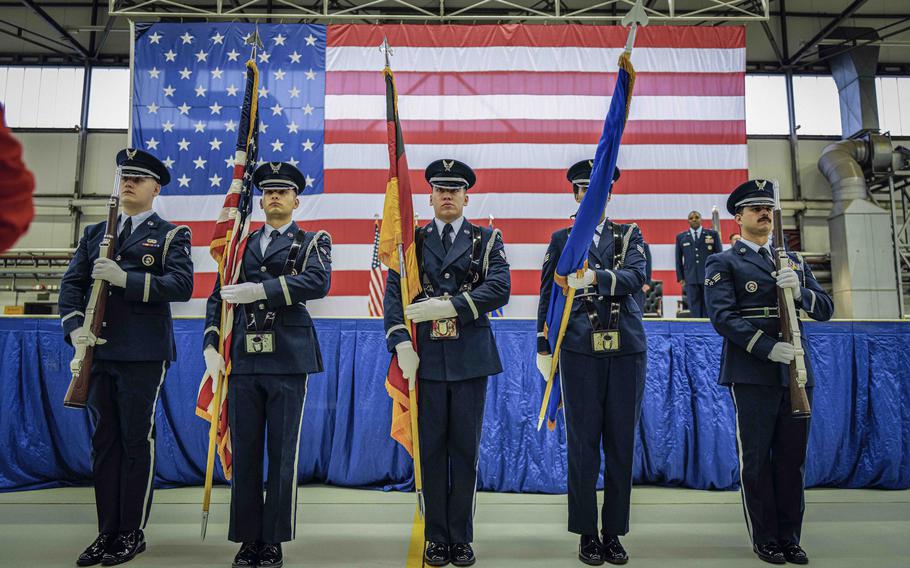 Honor guardsmen present the colors during the 86th Airlift Wing change of command ceremony at Ramstein Air Base, Germany, on May 17, 2024.