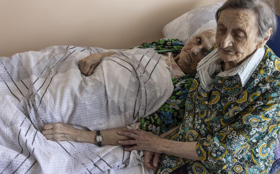 Sisters Hanna and Valentina Lobanova at a shelter in Kharkiv.