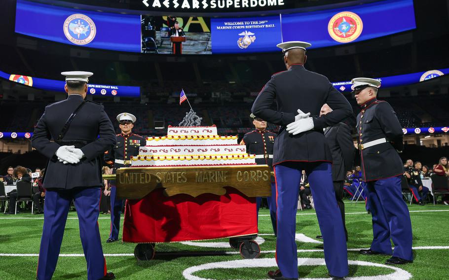 The U.S. Marine Forces Reserve present a birthday cake during a Marine Corps ball in Caesars Superdome, New Orleans, Nov. 2, 2024.