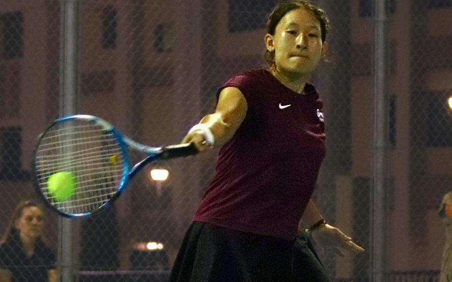 Matthew C. Perry's Sasha Malone hits a forehand during this weekend's Samurai Slam mixed doubles tennis tournament. Malone and partner Ren Spinosi won the tournament.