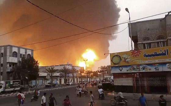 In this image from video, smoke and flames rise from a site in Hodeidah, Yemen, on Saturday, July 20, 2024. The Israeli army says it struck several Houthi targets in western Yemen following a fatal drone attack by the rebel group in Tel Aviv the previous day. (AP Photo)