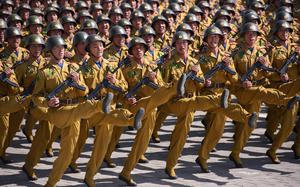 Korean People's Army (KPA) soldiers march during a mass rally on Kim Il Sung square in Pyongyang on Sept. 9, 2018. North Korea held a military parade to mark its 70th birthday, but refrained from showing off the intercontinental ballistic missiles that have seen it hit with multiple international sanctions. (Ed Jones/AFP/Getty Images/TNS)