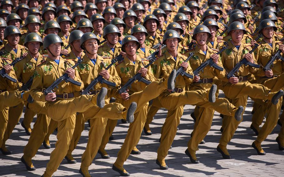 North Korean soldiers march during a military parade in 2018.