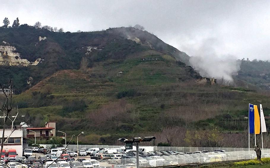 Steam from a crater of Campi Flegrei billows in Pozzuoli, Italy, in 2018. The Navy is requiring personnel planning to live in Pozzuoli and other areas to sign a letter acknowledging they are aware of the dangers associated with living in high-risk areas for volcanic eruptions and earthquakes.