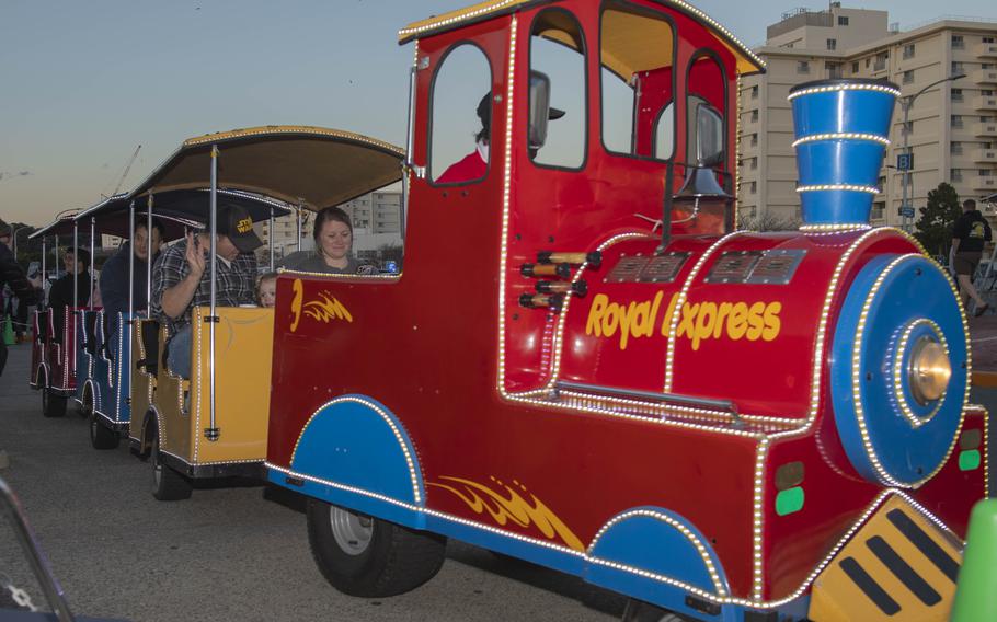 A train filled with families at the Christmas celebration.