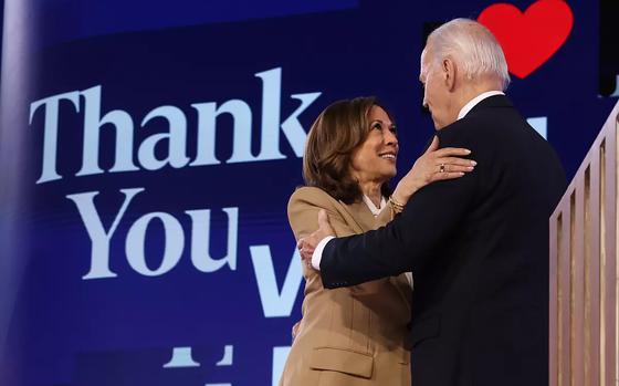 Vice President Kamala Harris embraces President Biden after his speech Monday night at the Democratic National Convention in Chicago. (Robert Gauthier/Los Angeles Times/TNS)