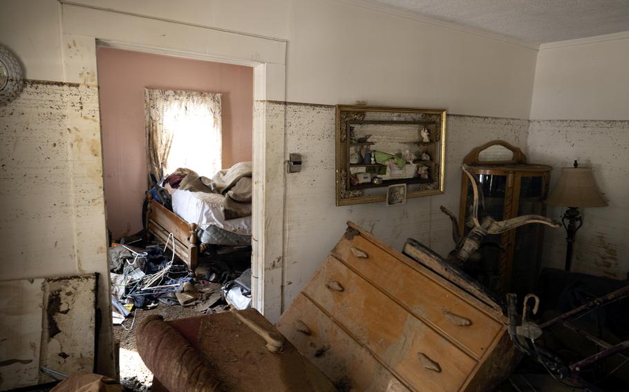 Debris litters a home.