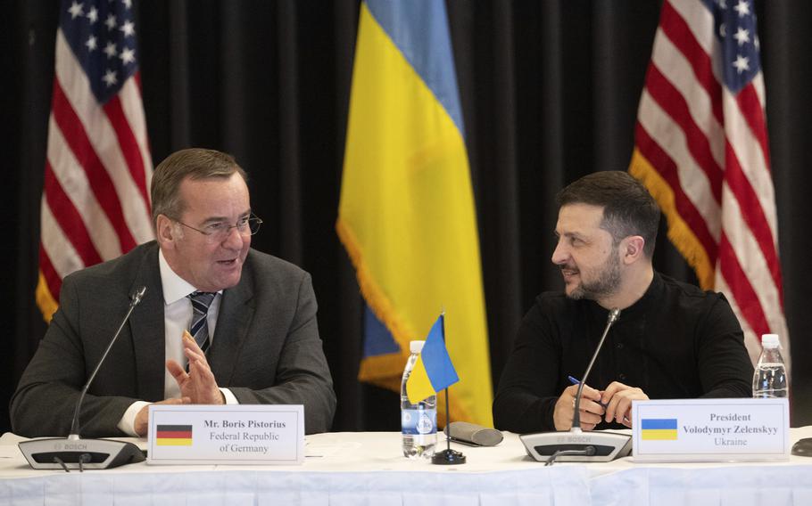 Ukrainian President Volodymyr Zelenskyy, right, and German Defence Minister Boris Pistorius attend a meeting of the Ukraine Contact Group