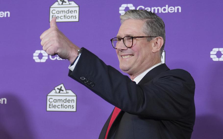 British Labour Party leader Keir Starmer gives a thumbs up to his supporters in London after winning his parliamentary election on July 5, 2024.