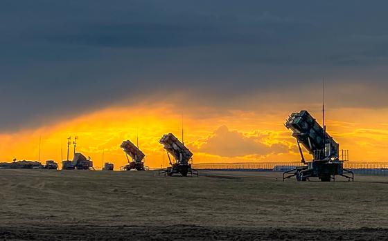 U.S. Patriot missile batteries from the 5th Battalion, 7th Air Defense Artillery Regiment, seen at sunset in Poland in 2022. NATO has taken command and control from the United States of air defense efforts in the country, according to U.S. military officials.