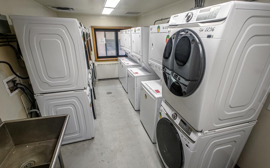 The inside of a dormitory at Kunsan Air Base showing a laundry room.