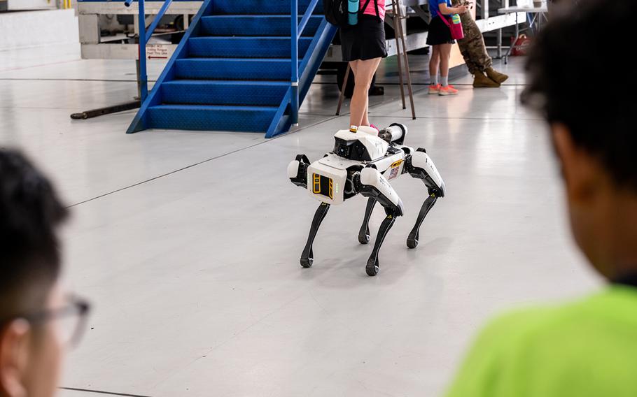 Local students control a robot at the 2024 Wings Over Whiteman STEM Fest at Whiteman Air Force Base, Mo., July 12, 2024. STEM Fest celebrated a nationwide challenge to foster creativity; critical thinking; and a passion for science, technology, engineering and mathematics among elementary, middle and high school students. 