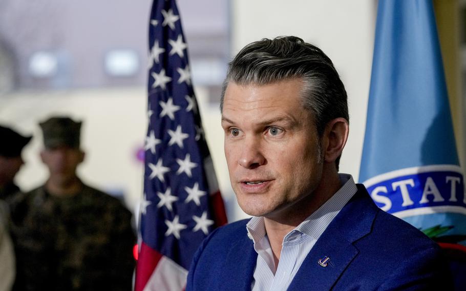 U.S. Secretary of Defense Pete Hegseth talks to the media.