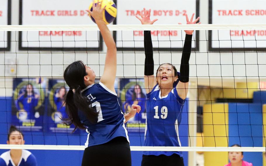 Audrey Riel hits against a block.