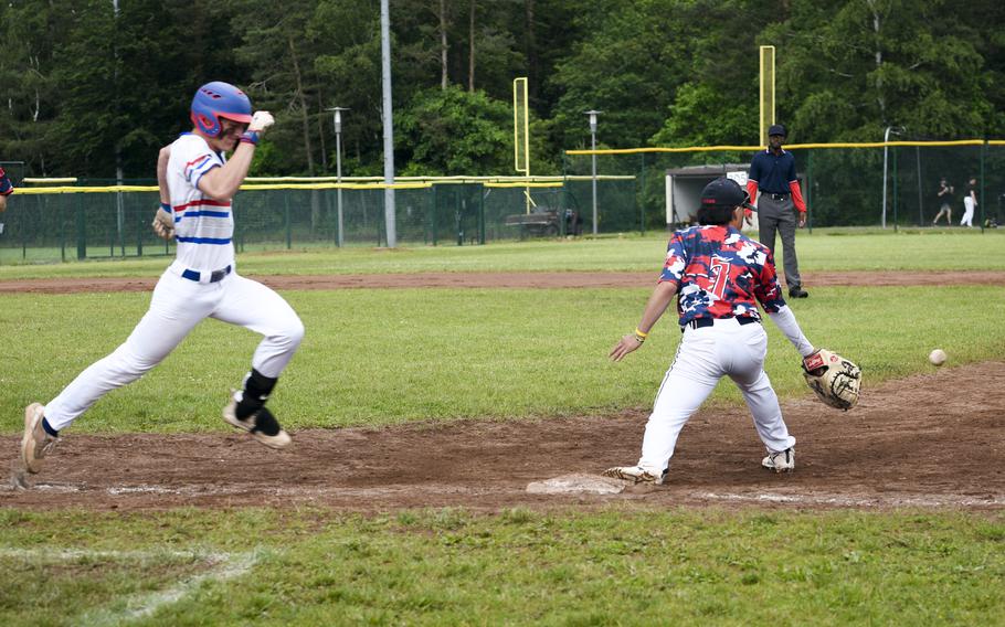 Lakenheath’s Tyler Chiappetta stretches out for the out in a 16-1 loss to Ramstein during the knockout rounds of the 2024 DODEA European baseball championships on May 23, 2024, at Southside Fitness Center on Ramstein Air Base, Germany.