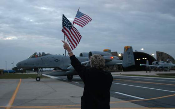 HED: Back on friendly turf, 2003

Spangdahlem Air Base, Nov. 24, 2003: Carol Malackowski, wife of Lt. Col. Patrick Malackowski, waves her husband in as he pilots his A-10 Thunderbolt II to a Spangdahlem Air Base hangar. Malackowski, commander of the 81st Fighter Squadron, returned with seven other A-10 pilots from a six-month deployment in Bagram, Afghanistan.

META TAGS: Welcome Home; coming home; U.S. Air Force; Operation Enduring Freedom; Wars on Terror