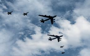 Two B-52H Stratofortresses from Barksdale Air Force Base, La., fly in formation with fighter jets from Romania and Finland as they arrive at Mihail Kogalniceanu Air Base, Romania, on July 21, 2024. Earlier in the day, the B-52s were intercepted by two Russian aircraft over the Barents Sea.