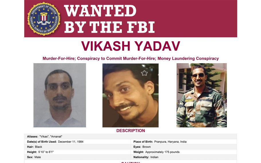 An FBI wanted poster with three photos of Indian national Vikash Yadav.