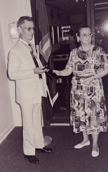 Medal of Honor recipient Desmond Doss visits with museum curator Judy Matteson. Doss trained at Fort Jackson with the 307th infantry Regiment, 77th Infantry Division during World War II.